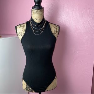Sleeveless Turtleneck Bodysuit